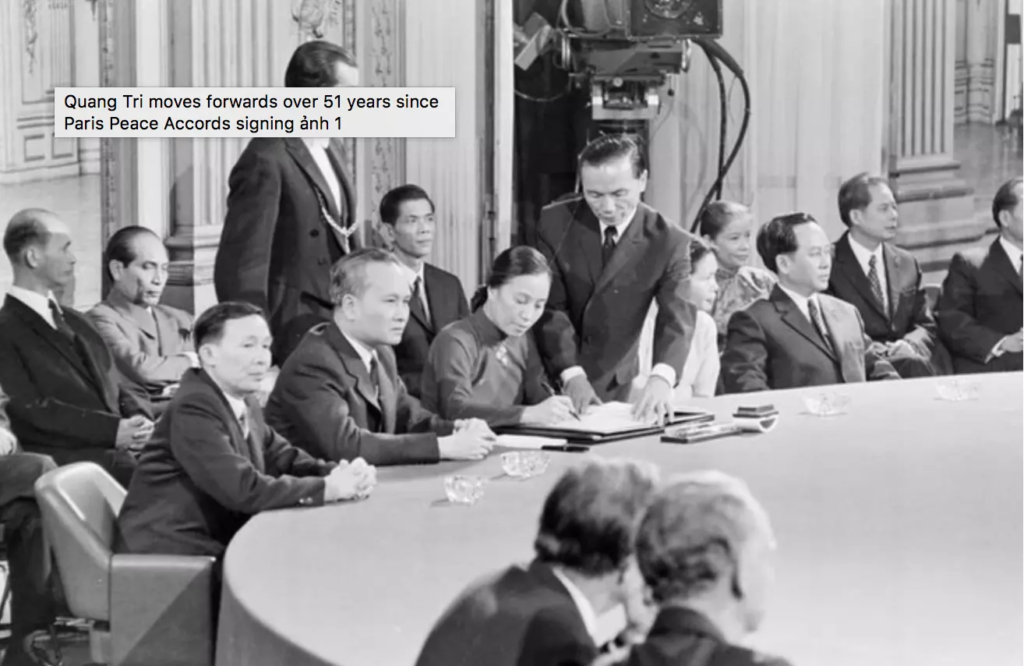 Nguyen Thi Binh, Foreign Minister of the Provisional Revolutionary Government of the Republic of South Vietnam, signs the Paris Peace Accords at the international convention centre in Paris